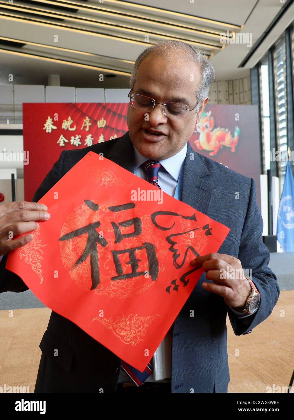 Geneva, Switzerland. 2nd Feb, 2024. Bilal Ahmad, permanent representative of Pakistan to the UN office in Geneva, shows the Chinese character 'Fu', which means 'good fortune', during an event to celebrate the upcoming Spring Festival in Geneva, Switzerland, Feb. 2, 2024. The United Nations (UN) Office in Geneva celebrated the upcoming Spring Festival on Friday, gathering about 300 diplomats and representatives from 51 countries and 15 international organizations. TO GO WITH 'Roundup: UN diplomats celebrate Spring Festival in Geneva' Credit: Wang Qibing/Xinhua/Alamy Live News Stock Photo