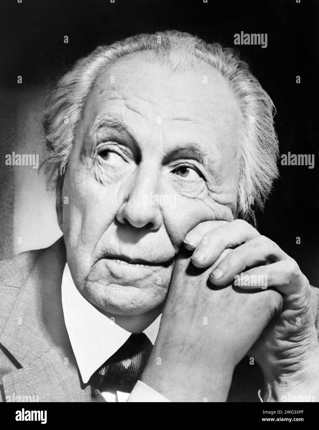 Frank Lloyd Wright (1867-1959), American architect pioneer of the Prairie School movement, in a portrait from 1954. Wright would later be recognized (in 1991) by the American Institute of Architects as 'the greatest American architect of all time.' Stock Photo