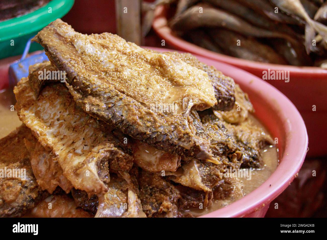 Different kinds of khmer fermented fish called prahok and pa ok sold on the local market showing the authentic traditional cuisine and culture of Camb Stock Photo