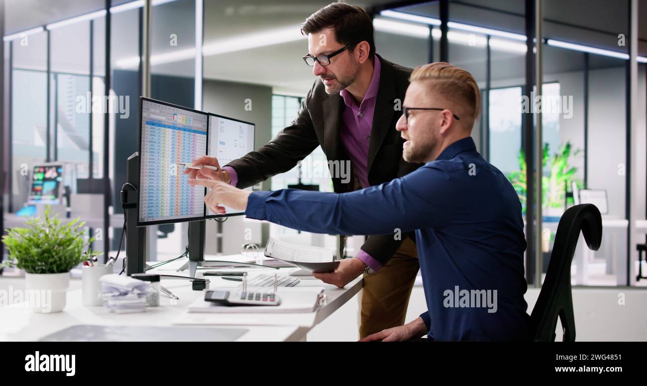 Spreadsheet Analyst Employee Worker. Medical Report On Computer Stock Photo