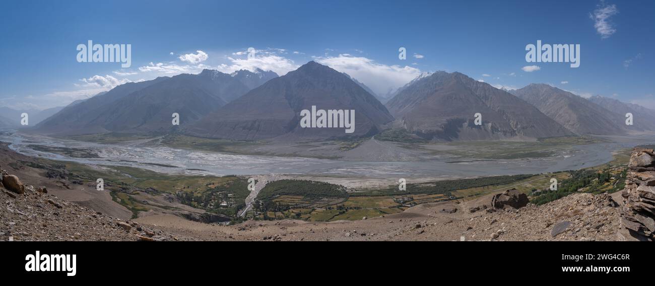 Scenic panoramic view of the Wakhan corridor with Afghanistan mountains in background from ancient Yamchun fortress , Gorno-Badakshan, Tajikistan Stock Photo