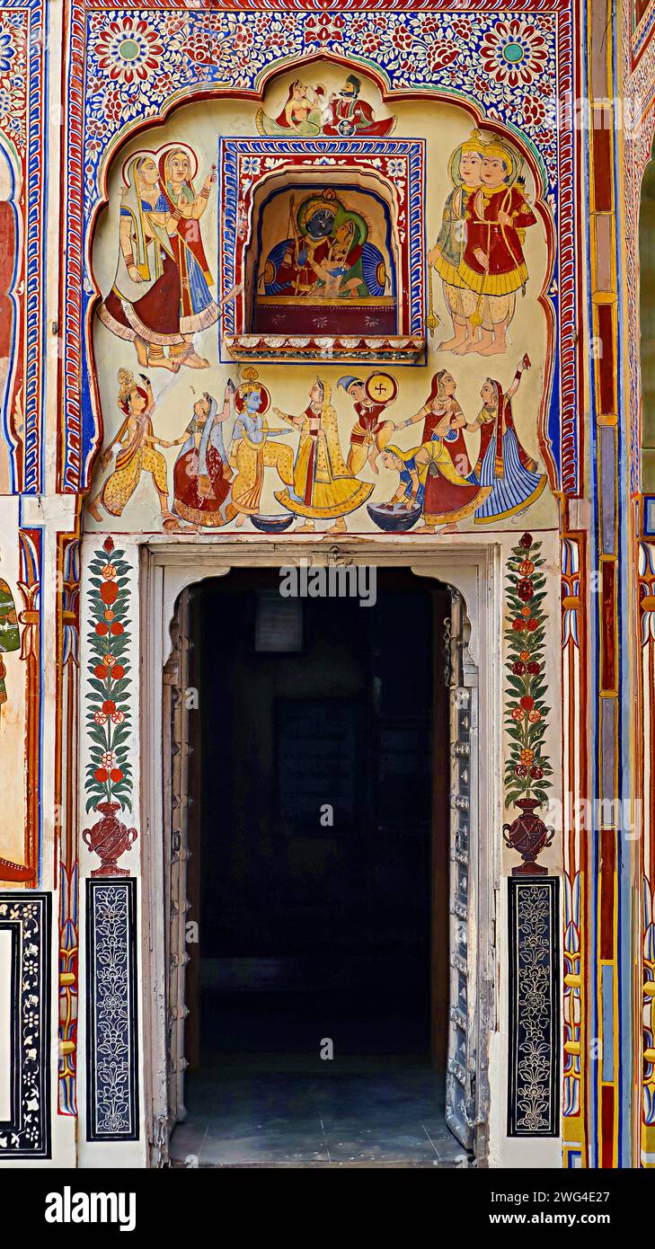 Painting of Rangpanchami celebration of Krishna and Gopikas on the Dr. Ramnath Podar Haveli Museum, Nawalgarh, Rajasthan, India. Stock Photo