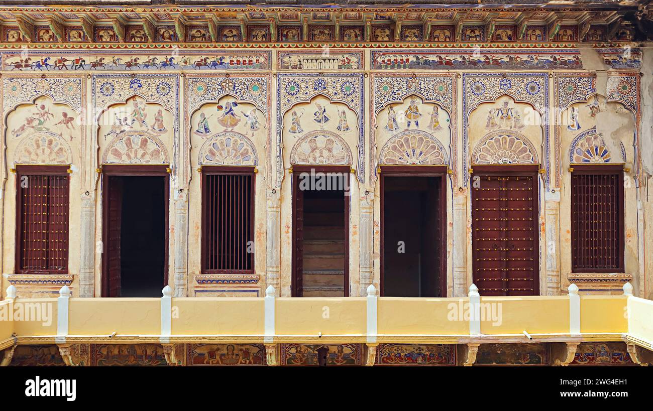 Paintings and windows of Shri Pushkar thalia Haveli, Mandawa, Jhunjhunu, Rajasthan, India. Stock Photo