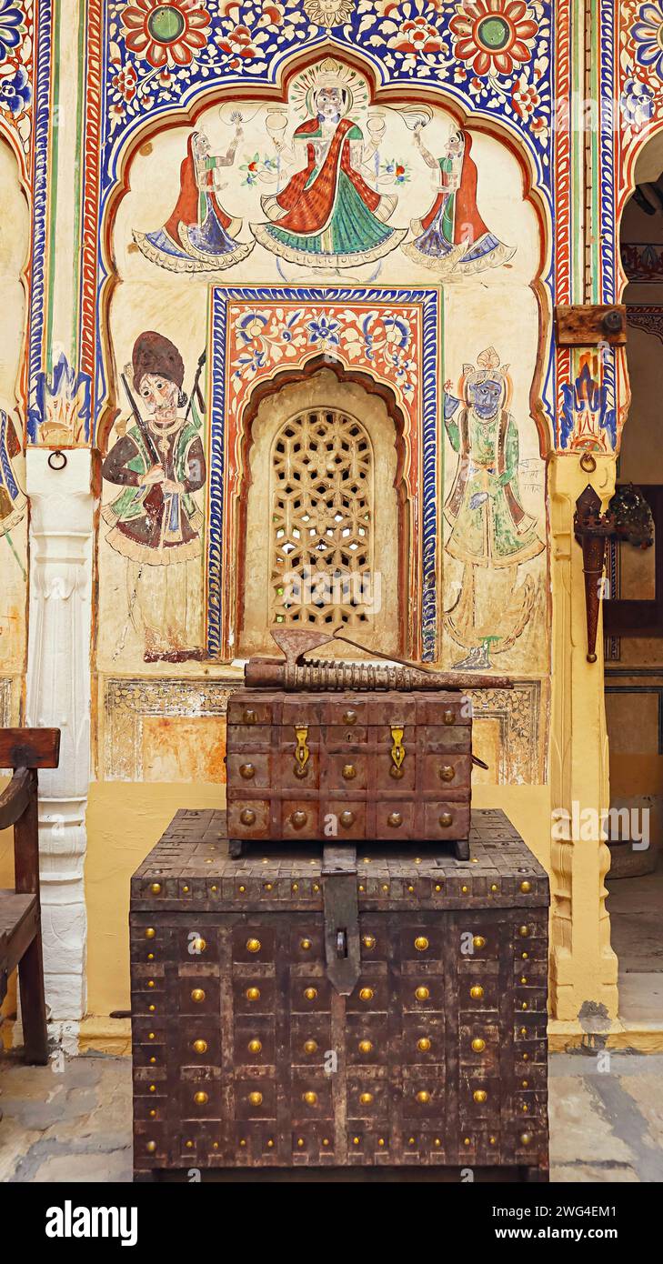 Paintings and ancient Iron Boxes in Shri Pushkar thalia Haveli, Mandawa, Jhunjhunu, Rajasthan, India. Stock Photo