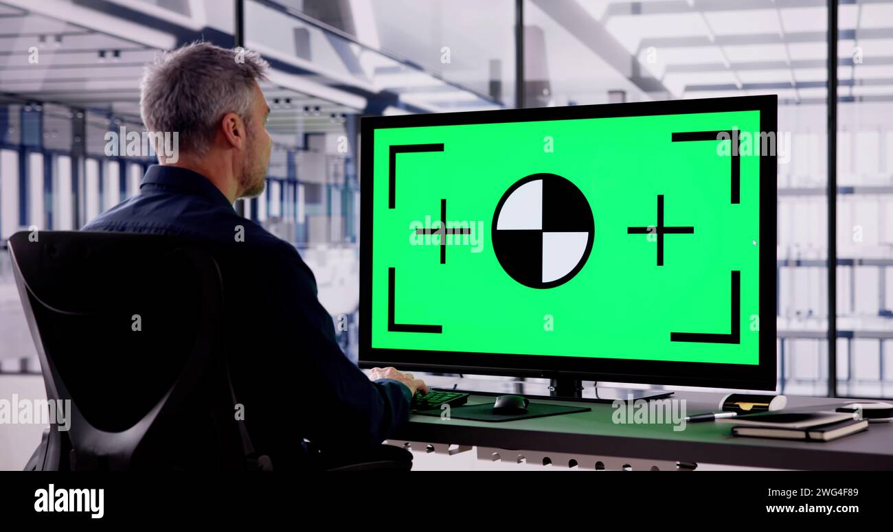 Business Man Using Desktop With Green Screen Stock Photo