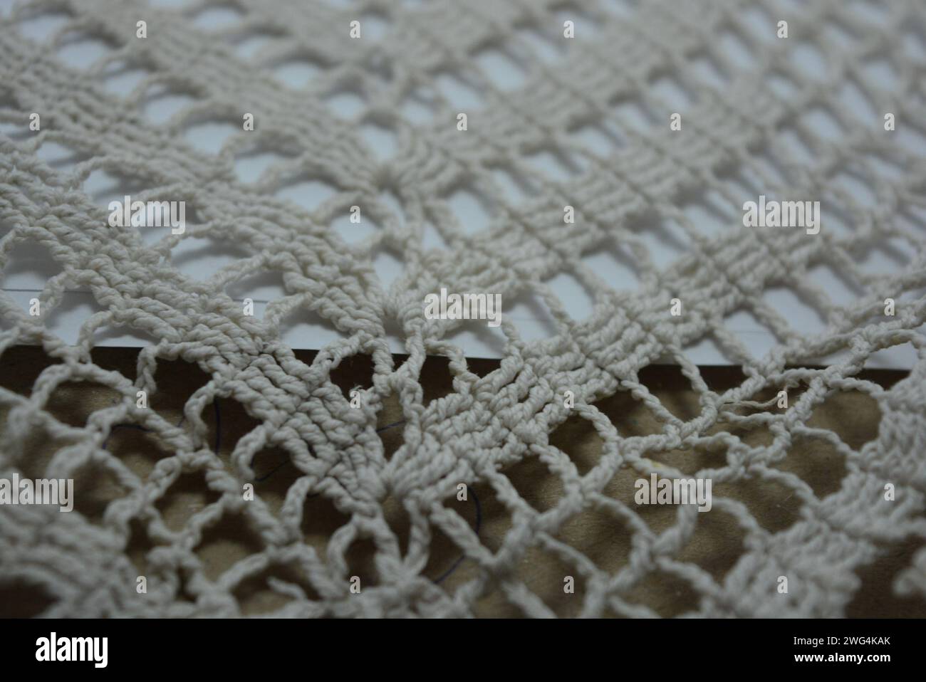 Beautiful white thread netting, macrame thread Stock Photo - Alamy