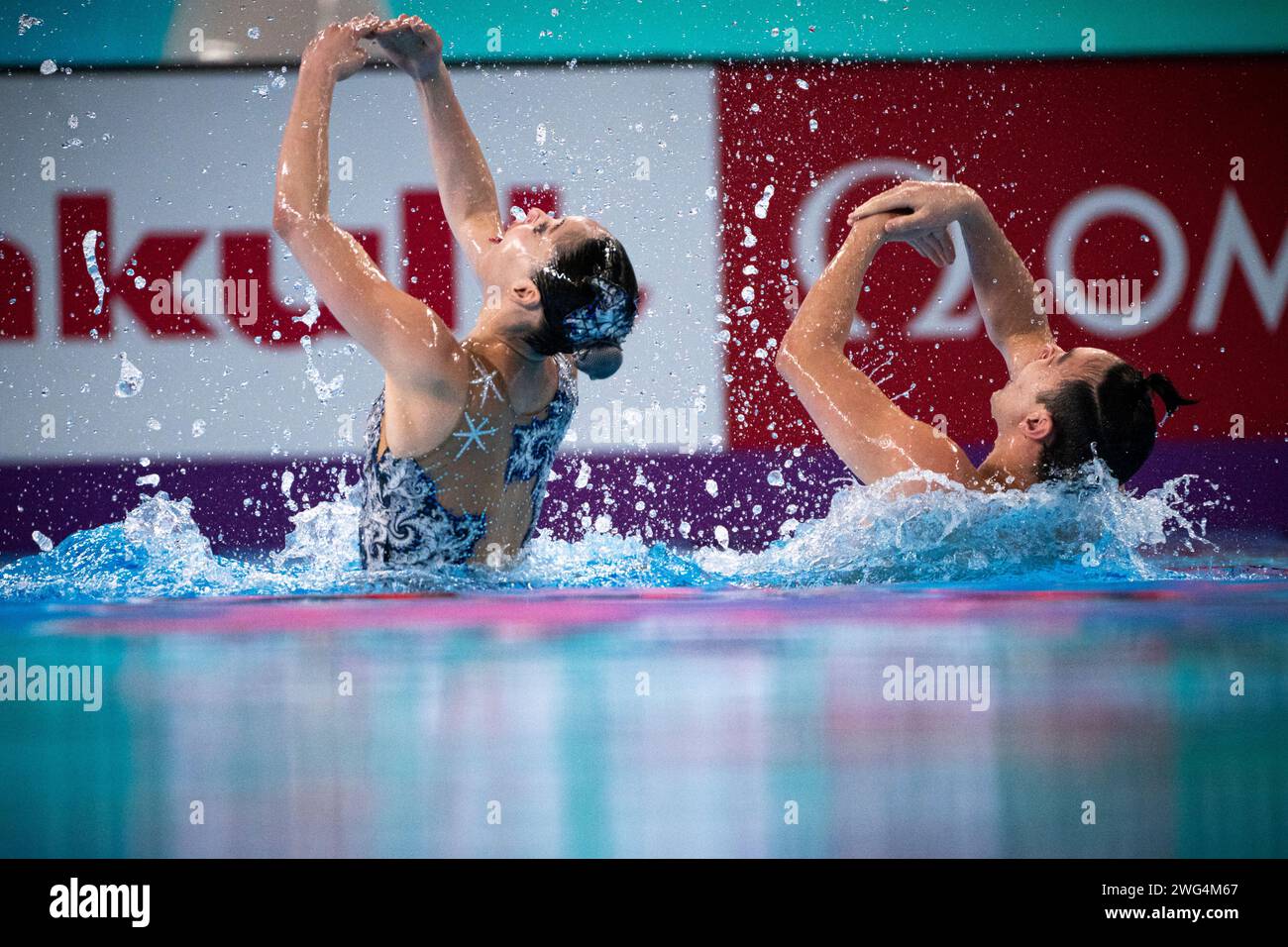 Nargiza Bolatova and Eduard Kim of Kazakhstan compete in the artistic swimming mixed duet technical preliminary during the 21st World Aquatics Championships at the Aspire Dome in Doha (Qatar), February 03, 2024. Stock Photo