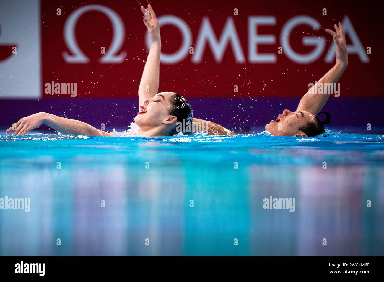 Nargiza Bolatova and Eduard Kim of Kazakhstan compete in the artistic swimming mixed duet technical preliminary during the 21st World Aquatics Championships at the Aspire Dome in Doha (Qatar), February 03, 2024. Stock Photo