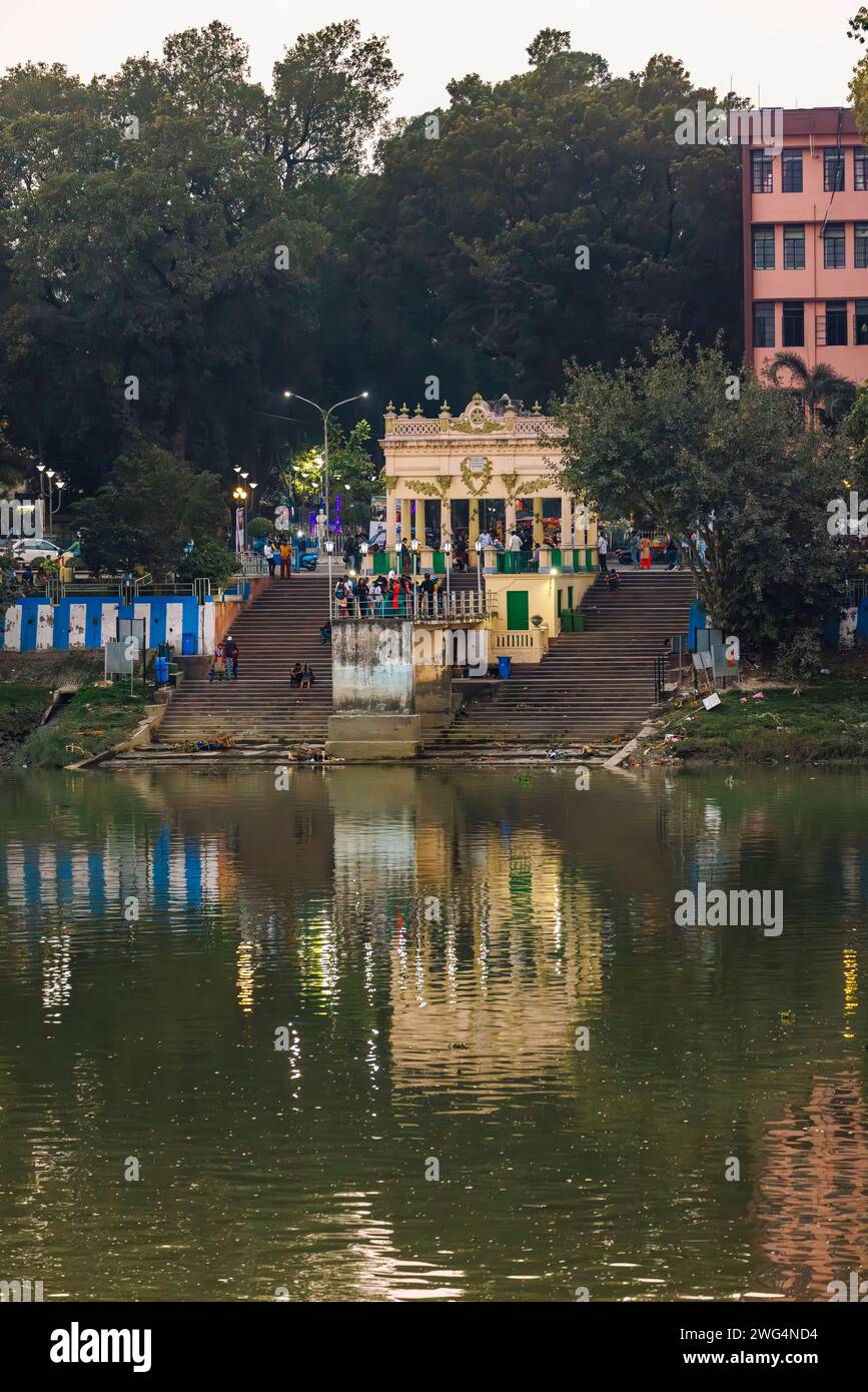 Typical riverside ghat and steps on the banks of the Hooghly River at dusk in Chandernagore (Chandannagar), North Barrackpore, West Bengal, India Stock Photo