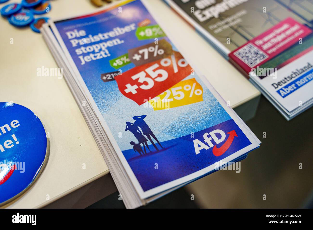 Augsburg, Bavaria, Germany - February 2, 2024: AfD Alternative for Germany Augsburg party stand at the AFA trade fair. Flyers for voters and future members and giveaways with AfD logo *** Messestand der Partei AfD Alternative für Deutschland Augsburg auf der AFA-Messe. Flyer für Wähler und zukünftige Mitglieder und Werbegeschenke mit AfD-Logo Stock Photo