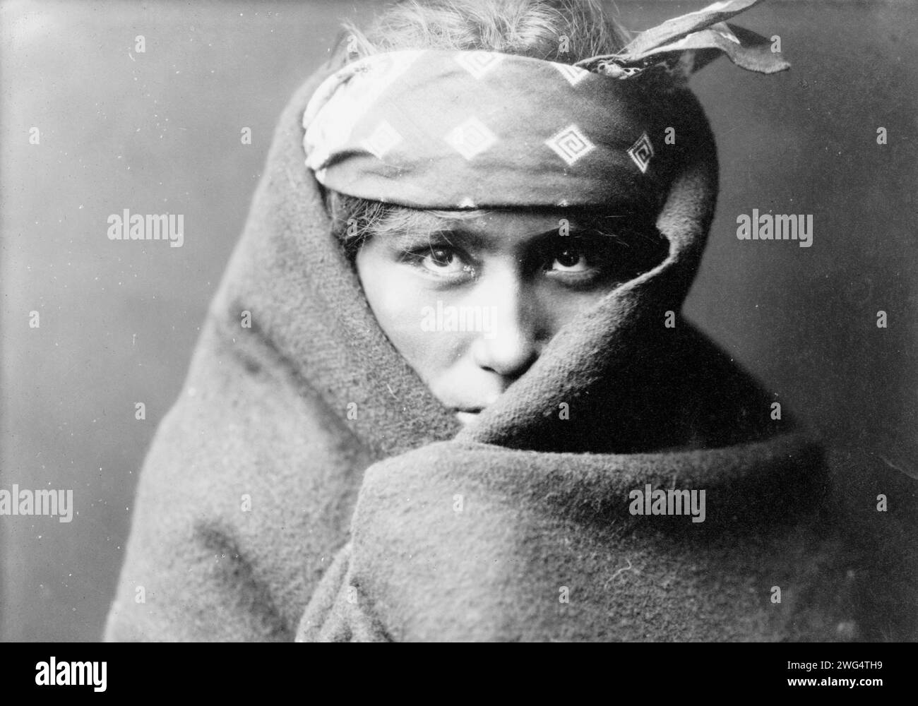 Many Goat's son, c1904. Headand shoulders portrait of Navajo boy