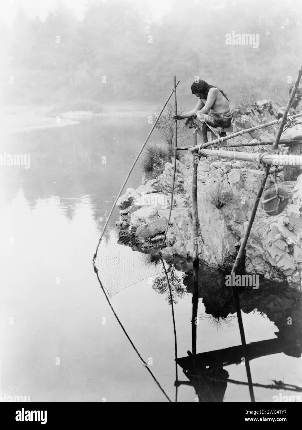 Indigenous man fishing Black and White Stock Photos & Images - Alamy
