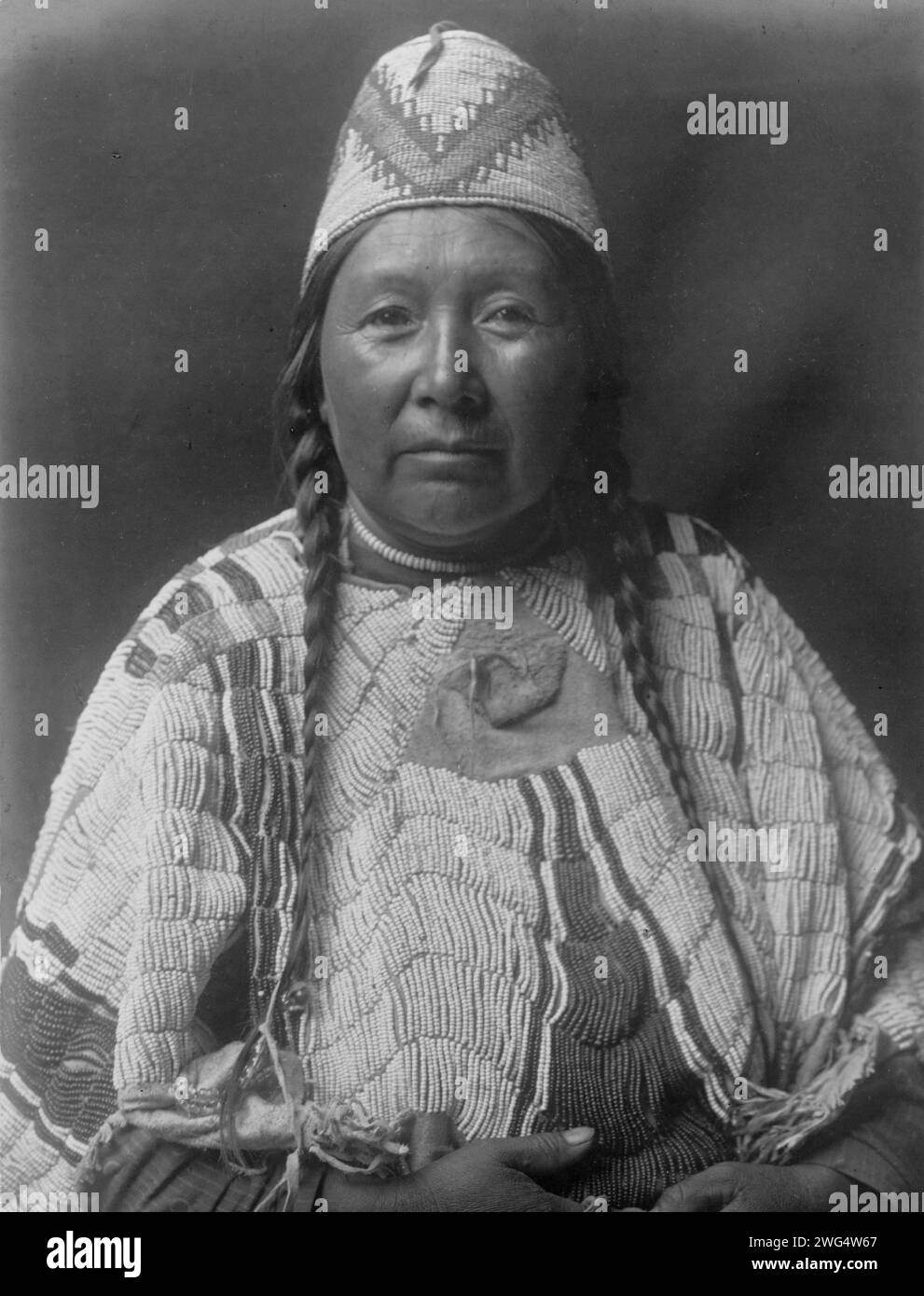Wife of MnainakYakima, c1910. Yakima woman, halflength portrait