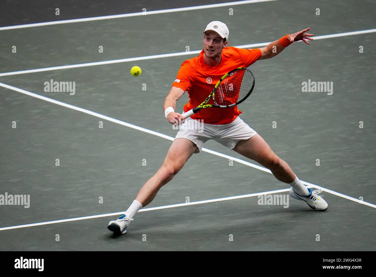 Groningen, Netherlands. 02nd Feb, 2024. GRONINGEN, NETHERLANDS - FEBRUARY 2: Botic van de Zandschulp of the Netherlands plays a backhand volley in his singles match against Leandro Riedi of Switzerland during day 1 of the 2024 Davis Cup Qualifiers match between Netherlands and Switzerland at the Martiniplaza on February 2, 2024 in Groningen, Netherlands. (Photo by Rene Nijhuis/BSR Agency) Credit: BSR Agency/Alamy Live News Stock Photo