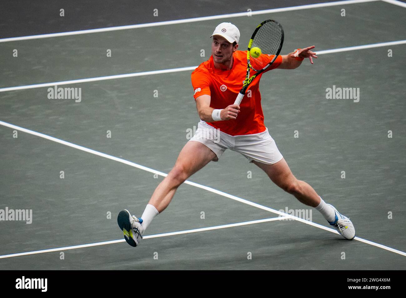 Groningen, Netherlands. 02nd Feb, 2024. GRONINGEN, NETHERLANDS - FEBRUARY 2: Botic van de Zandschulp of the Netherlands plays a backhand volley in his singles match against Leandro Riedi of Switzerland during day 1 of the 2024 Davis Cup Qualifiers match between Netherlands and Switzerland at the Martiniplaza on February 2, 2024 in Groningen, Netherlands. (Photo by Rene Nijhuis/BSR Agency) Credit: BSR Agency/Alamy Live News Stock Photo