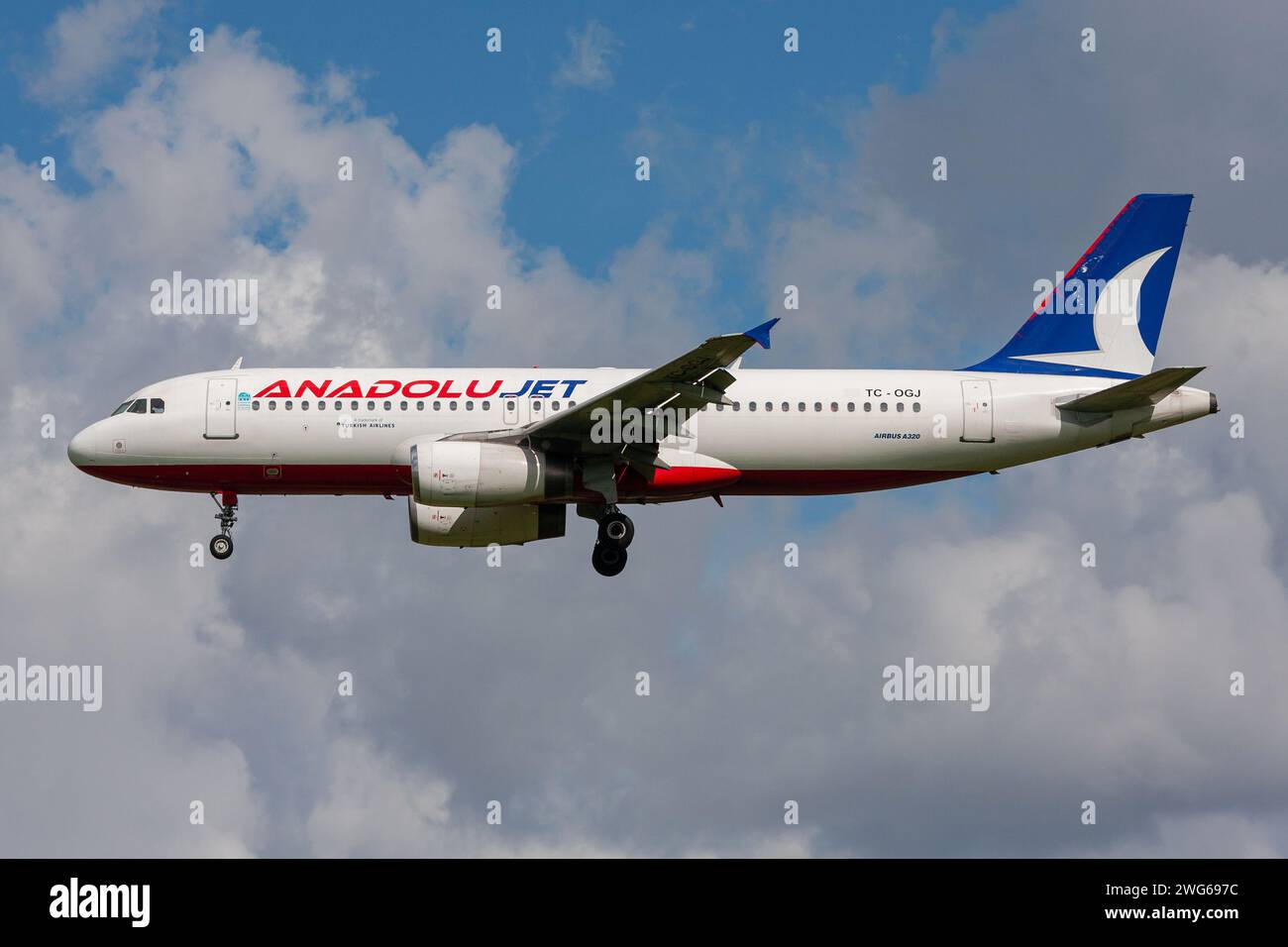 Turkish Anadolujet Airbus A320-200 with registration TC-OGJ on final for Amsterdam Airport Schiphol Stock Photo