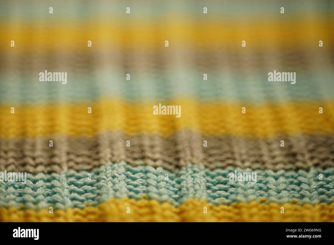 Soft background with striped blue, gray, yellow threads Stock Photo