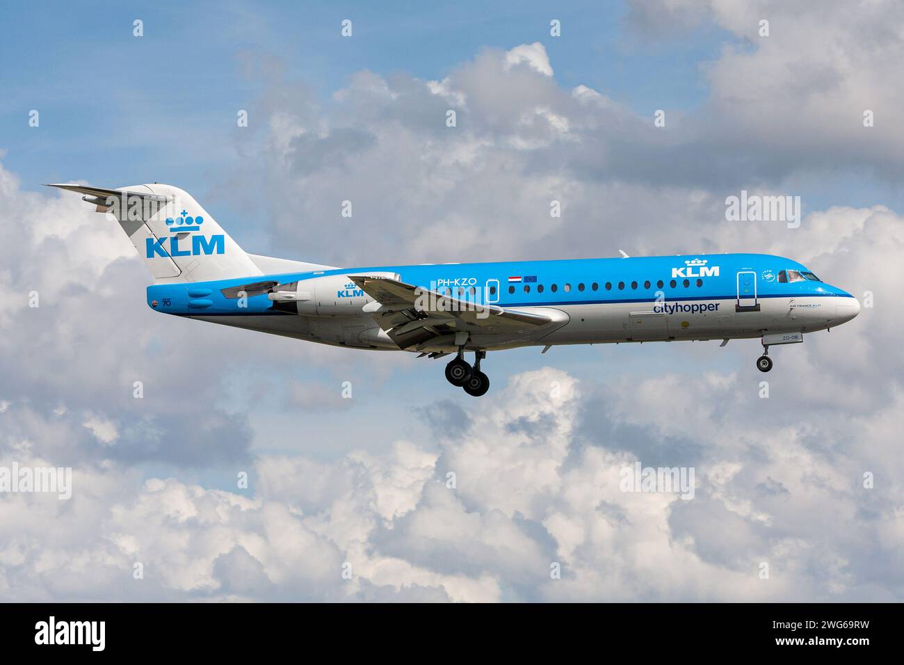 KLM Cityhopper Fokker 70 with registration PH-KZO on final for Amsterdam Airport Schiphol Stock Photo