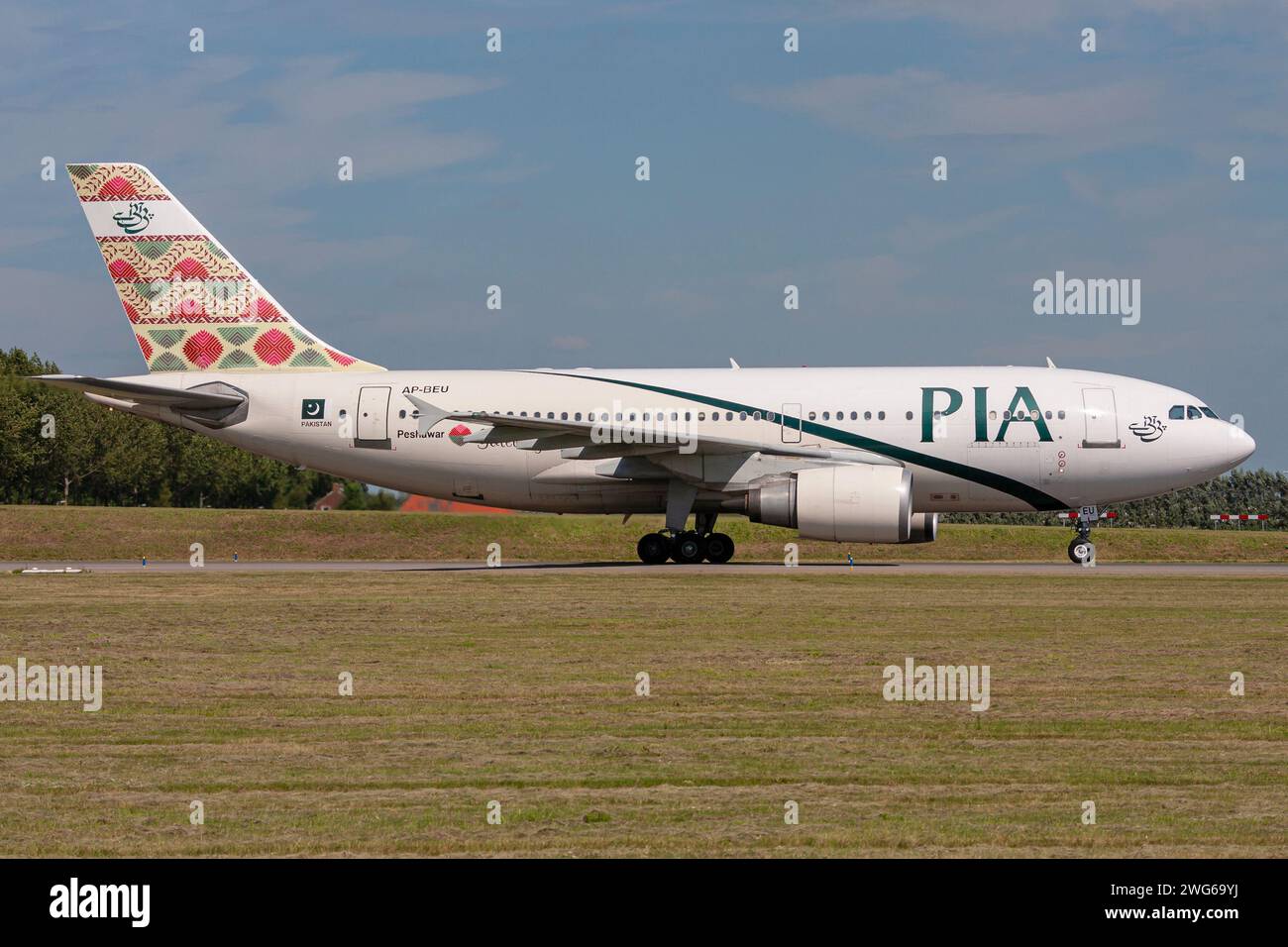 PIA Pakistan International Airlines Airbus A310-300 with registration AP-BEU rolling on taxiway V of Amsterdam Airport Schiphol Stock Photo