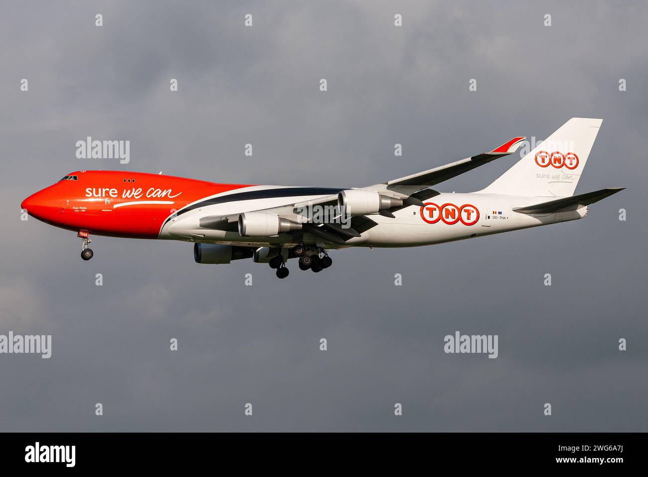 TNT Airways Boeing 747-400F with registration OO-THA on final for Amsterdam Airport Schiphol Stock Photo