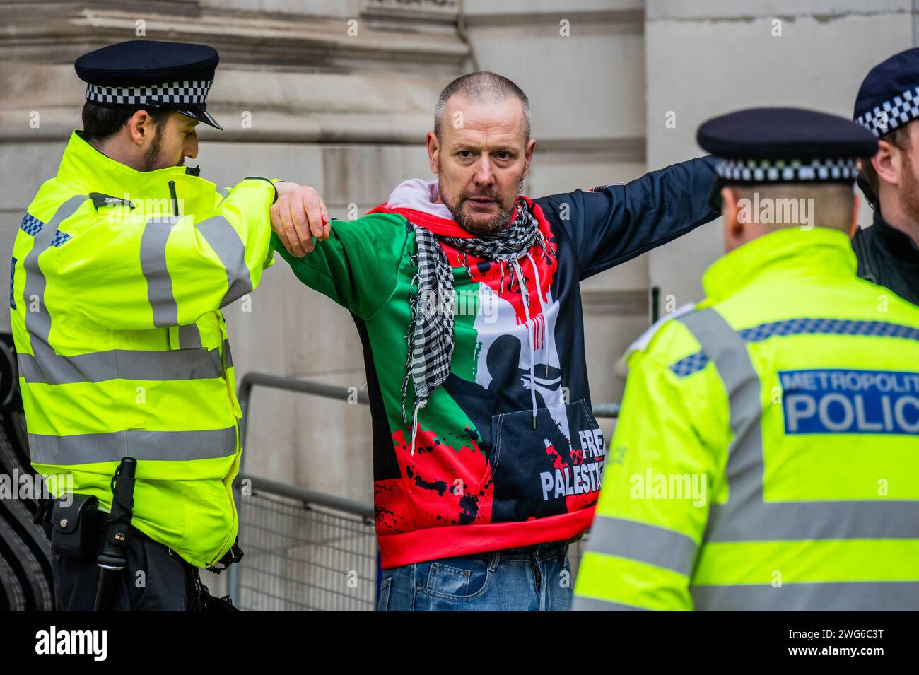 London UK 3rd Feb 2024 A Man Is Searched By The Police Palestine   London Uk 3rd Feb 2024 A Man Is Searched By The Police Palestine Protest Calling For A Ceasefire Now Marches From The Bbc To Tralgar Square For Speeches The Crowd Continue To Responding To The Ongoing Outbreak Of Violence And The Israeli Response In Gaza The Protest Was Organised By Stop The War The Palestine Solidarity Campaign Uk And Friends Of Al Aqsa Amongst Many Others Credit Guy Bellalamy Live News 2WG6C3T 