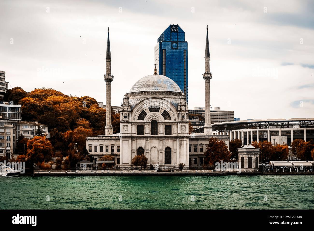 the facade of the Dolmabahce mosque on an autumn day photographed from the sea Stock Photo