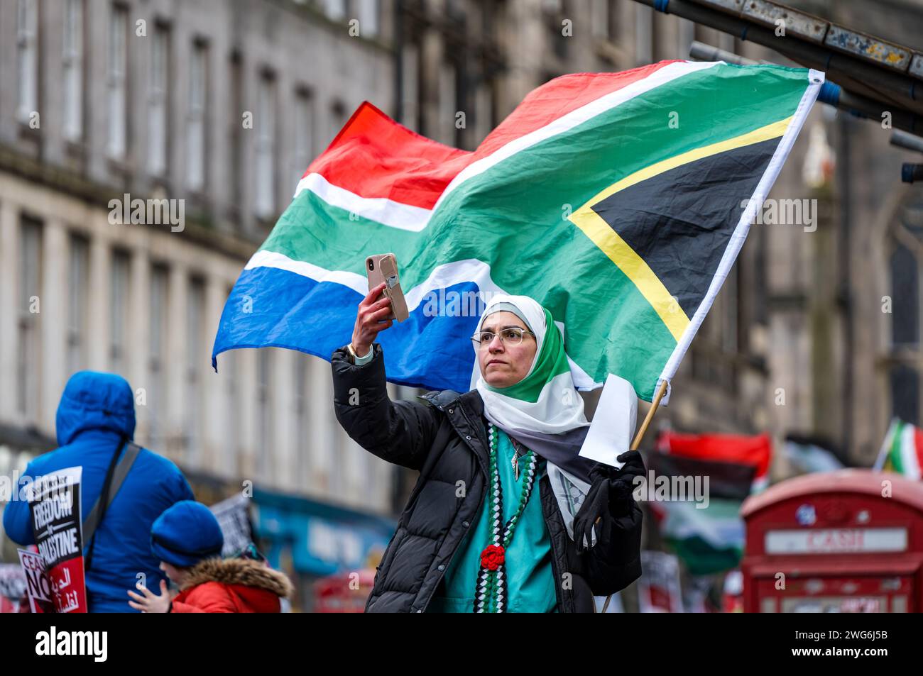Royal Mile, Edinburgh, Scotland, UK, February 3rd 2024. Pro Palestinian March: Hundreds of people march in a protest waving Palestinian flags in a demonstration against Israel organised by the Scottish Palestine Solidarity Campaign. Credit: Sally Anderson/Alamy Live News Stock Photo