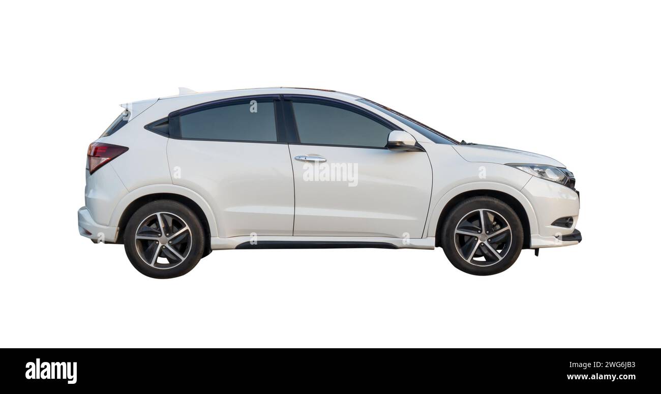 Side view of white hatchback car is isolated on white background with clipping path. Stock Photo