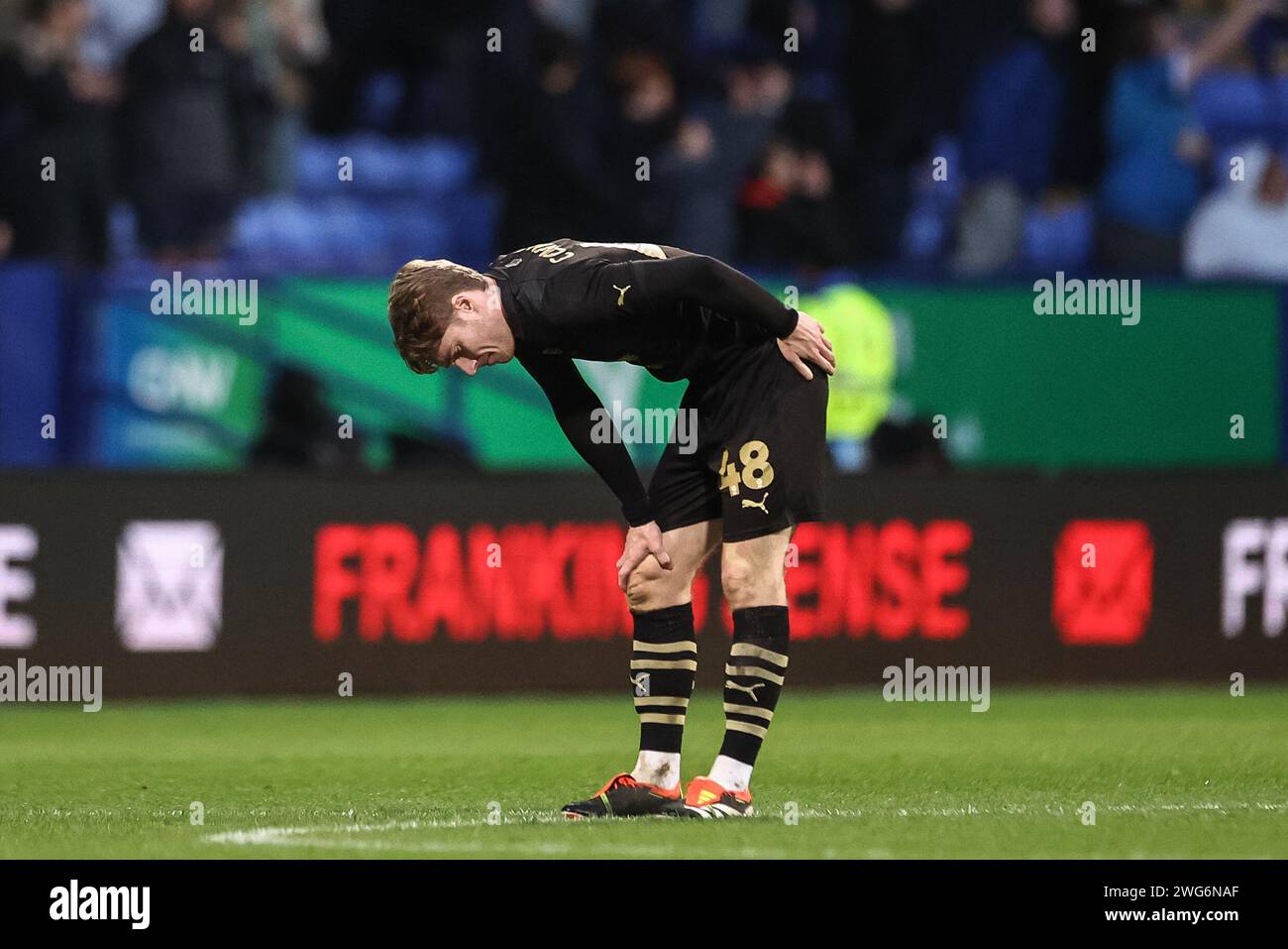 Luca Connell of Barnsley passed to catch his breath after the final whistle during the Sky Bet League 1 match Bolton Wanderers vs Barnsley at Toughsheet Community Stadium, Bolton, United Kingdom, 3rd February 2024  (Photo by Mark Cosgrove/News Images) Stock Photo