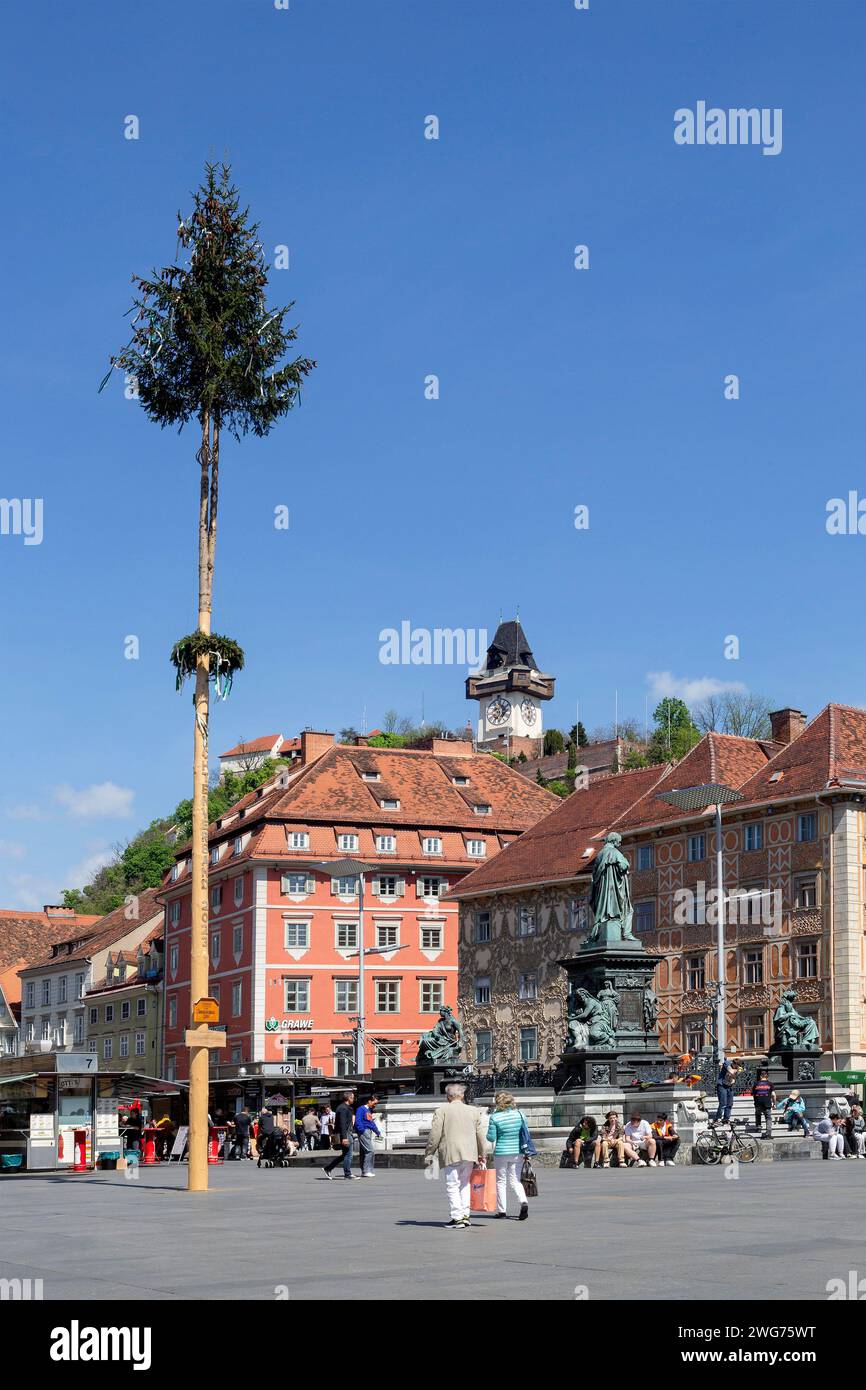 Maibaum, Graz Main Square With Erzherzog Johannbrunnen Overlooking The Clock Tower, Graz, Styria, Austria Stock Photo