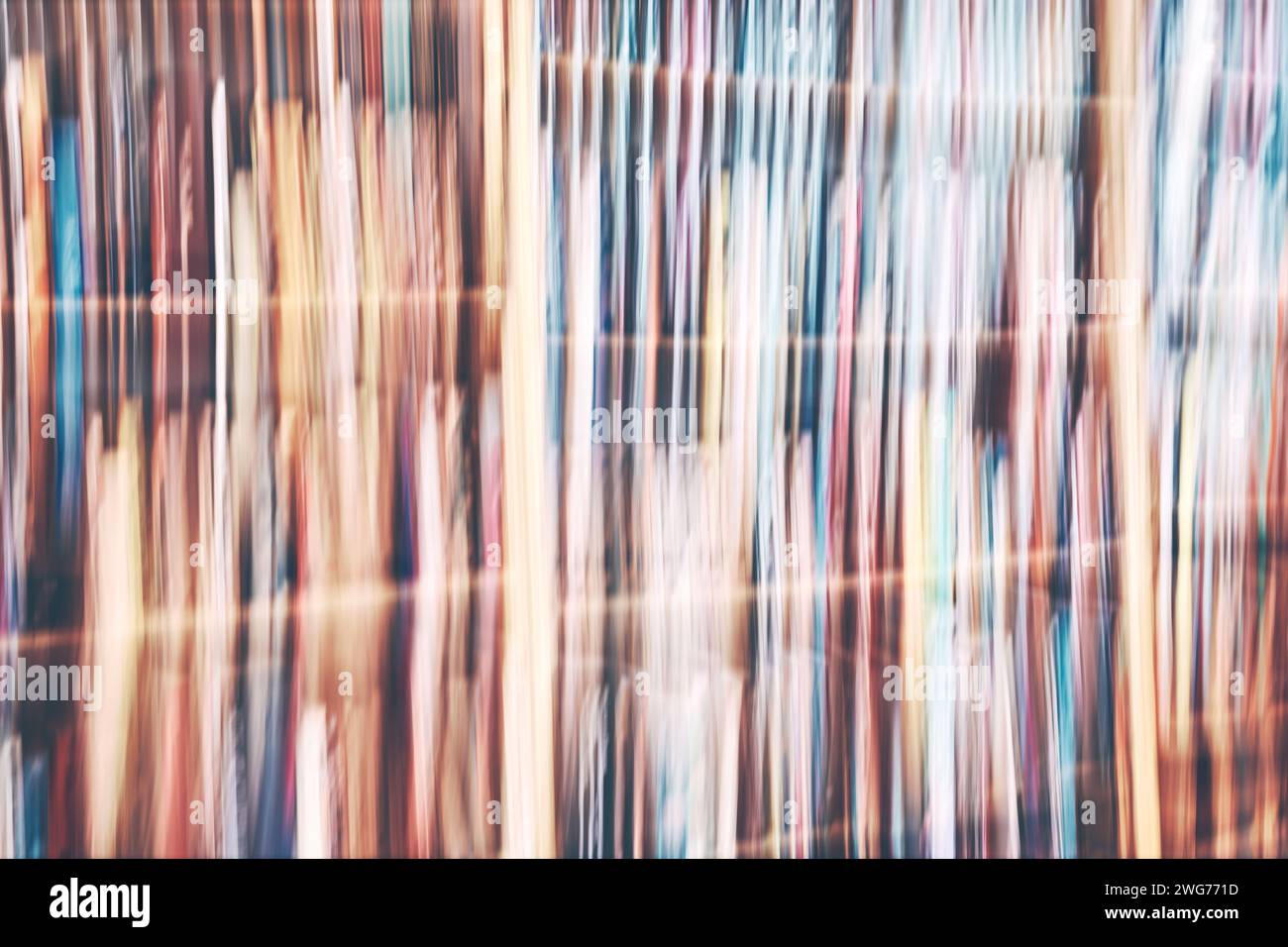Motion blurred rows of books, abstract background. Stock Photo