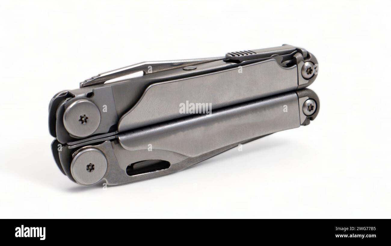 Folded steel multitool isolated on white background. A tool for daily