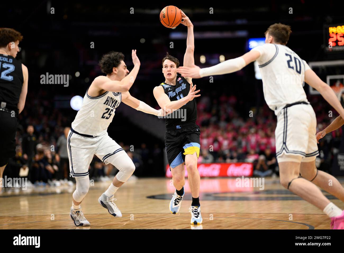 Marquette guard Tyler Kolek (11) passes against Georgetown forward
