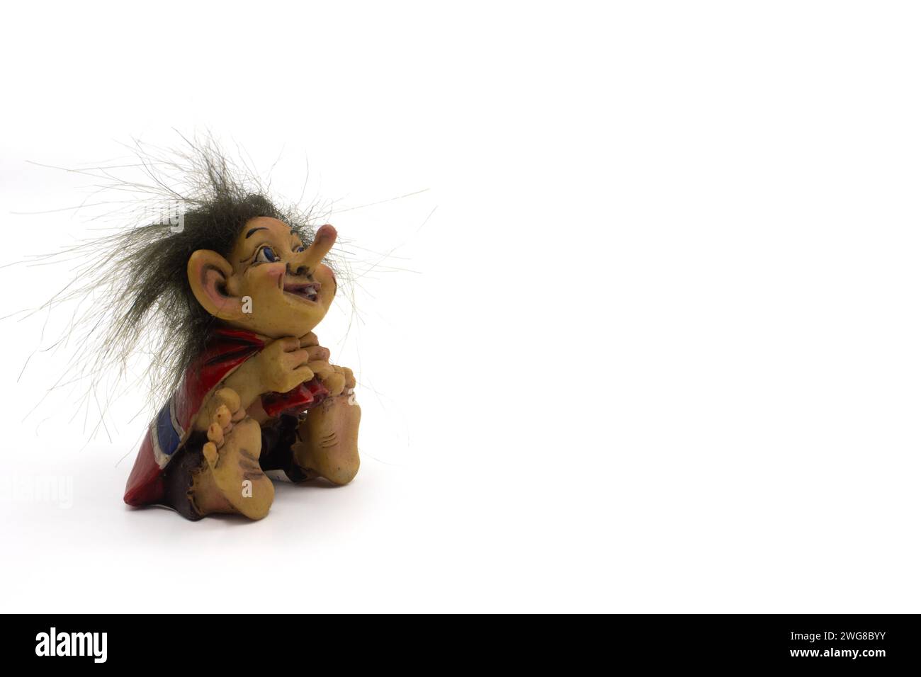 Funny ugly dirty troll toy Stock Photo