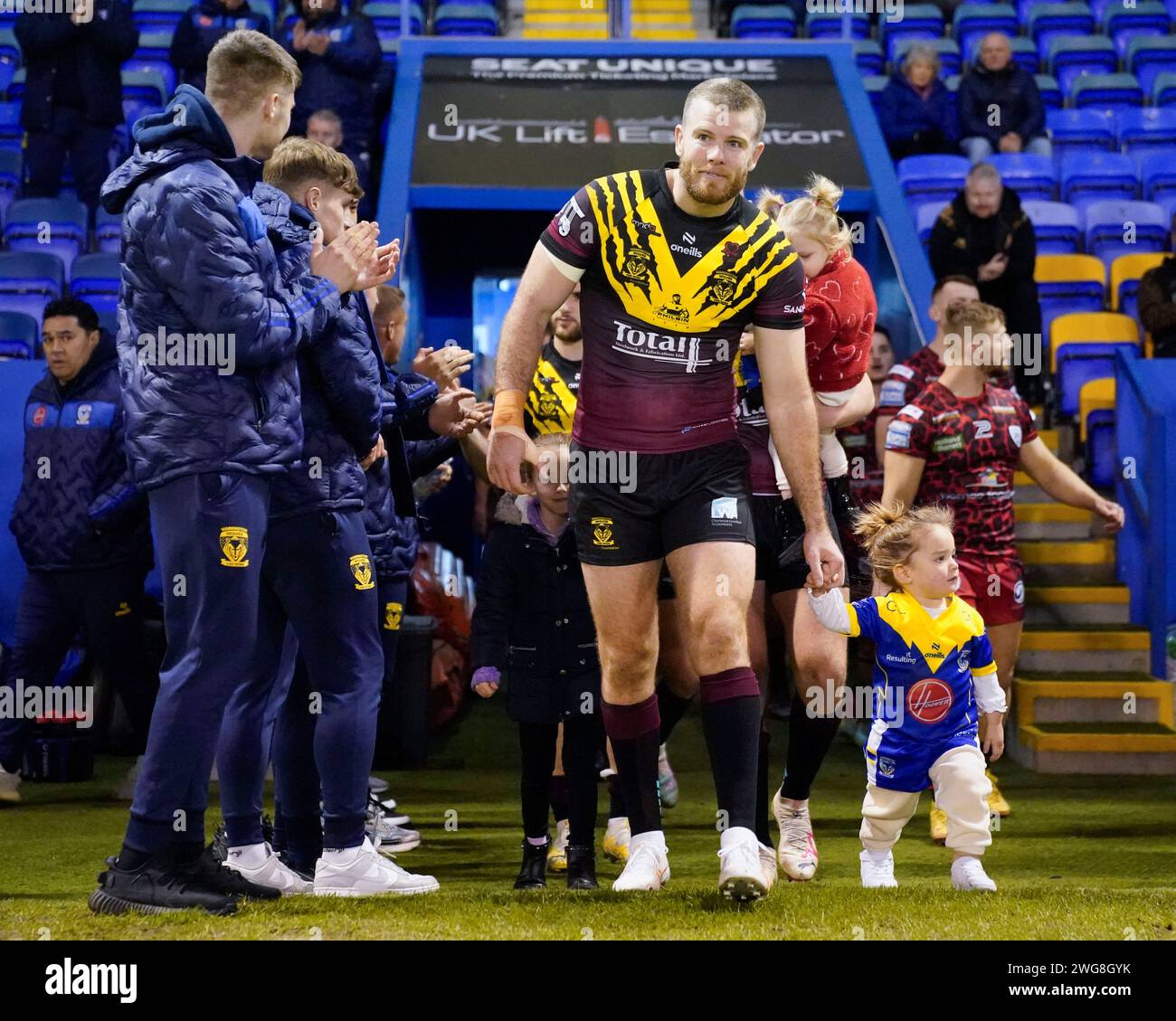 Lachlan Fitzgibbon of Warrington Wolves comes out onto the pitch before ...