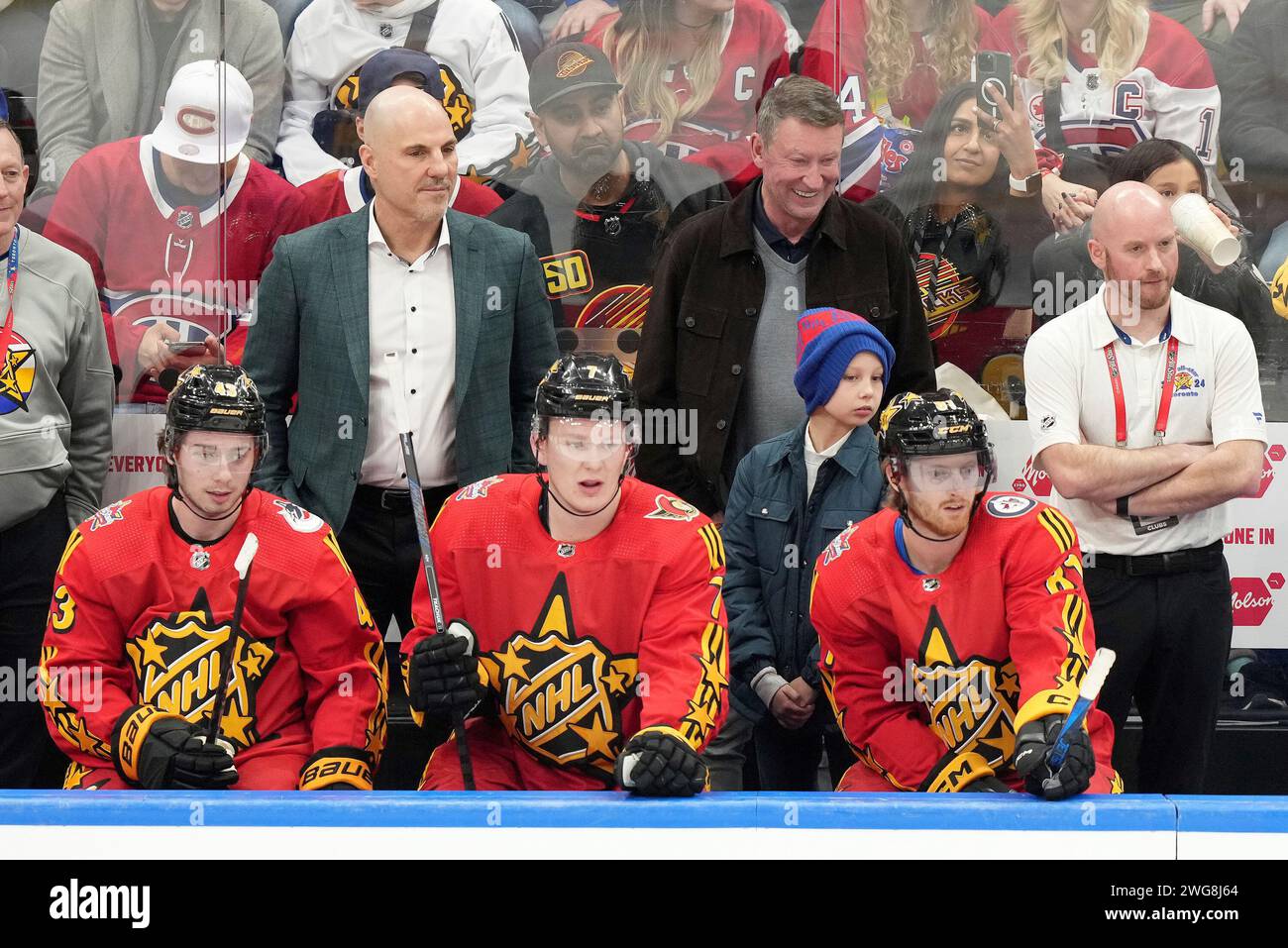 Team Hughes Coaches Rick Tocchet Rear Left And Wayne Gretzky Look On team-hughes-coaches-rick-tocchet-rear-left-and-wayne-gretzky-look-on
