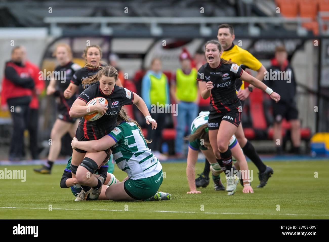 London, England on 3 February 2024.Sophie De Goede of Saracens Women is tackled by Liz Crake of Trailfinders Women during the Womens Allianz Premier 15s match between Saracens Women and Trailfinders Women at the StoneX Stadium,  Photo by Phil Hutchinson. Editorial use only, license required for commercial use. No use in betting, games or a single club/league/player publications. Credit: UK Sports Pics Ltd/Alamy Live News Stock Photo