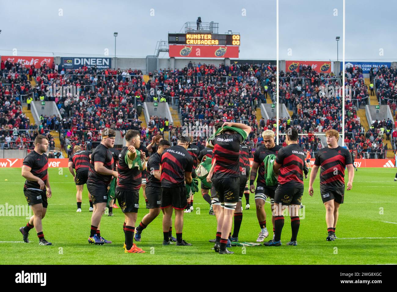 The Crusaders players during the test match between Munster Rugby and