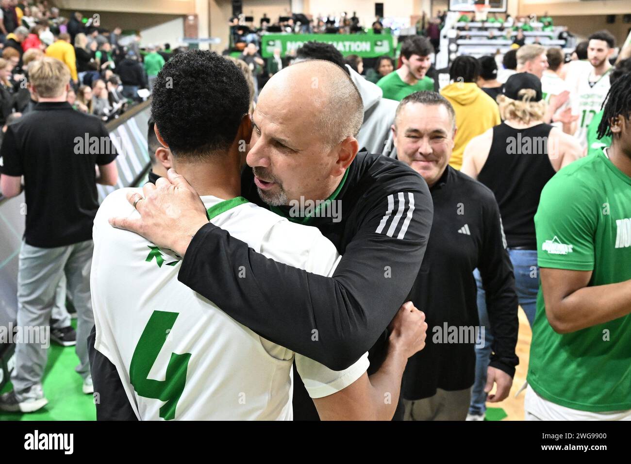 North Dakota Fighting Hawks head coach Paul Sather hugs .North Dakota Fighting Hawks guard Tyree Ihenacho (4) after winning an NCAA men's Summit League basketball game between the North Dakota State Bison and the University of North Dakota Fighting Hawks at Betty Engelstad Sioux Center in Grand Forks, ND on Saturday, February 3, 2024. North Dakota won 60-58.Russell Hons/CSM Stock Photo