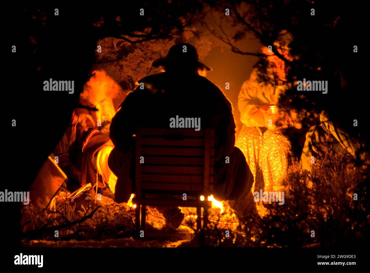 Campfire gathering silhouette, Grizzly Mountain Long Rifles Horse Ridge