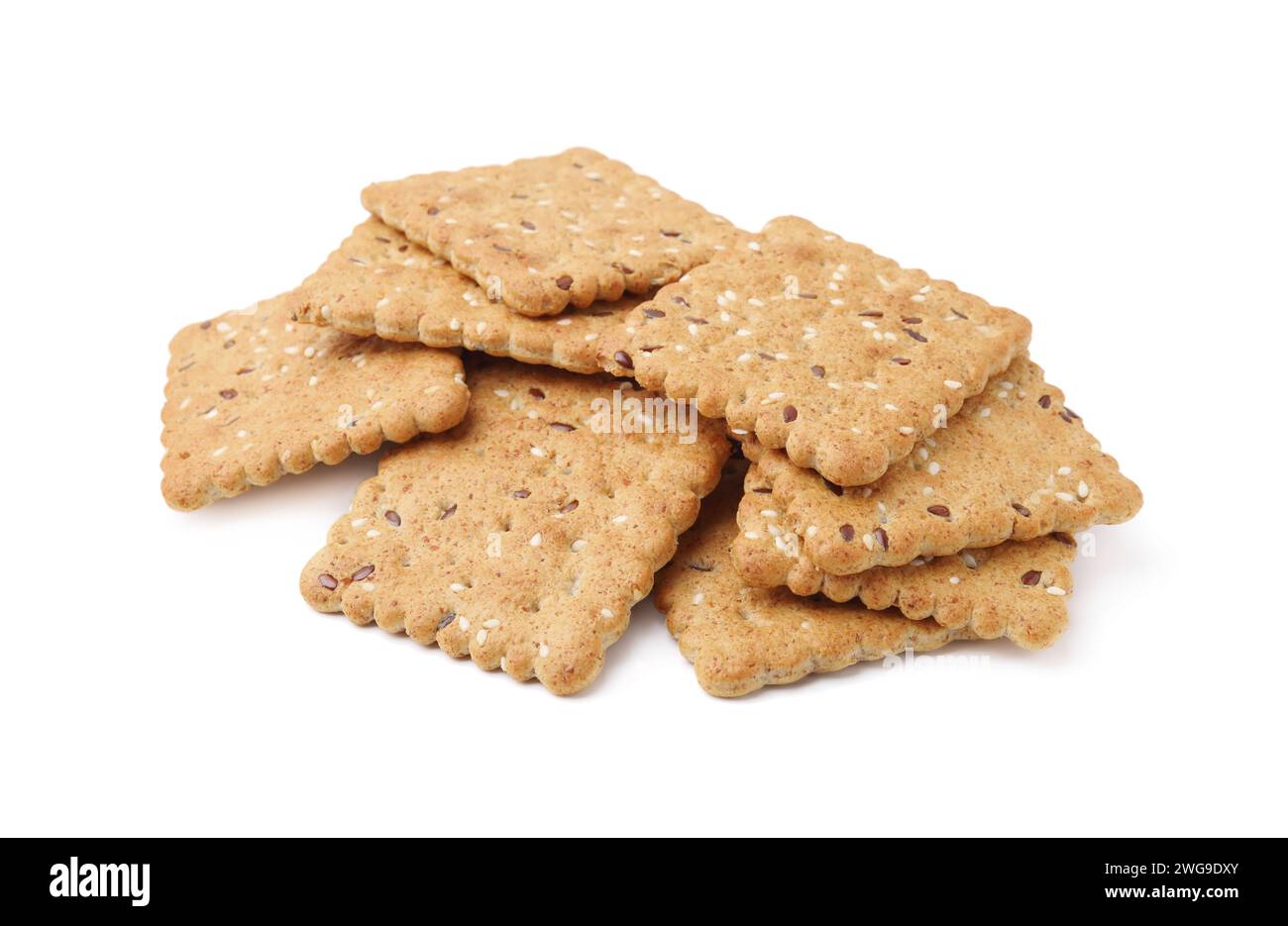 Pile of cereal crackers with flax and sesame seeds isolated on white ...