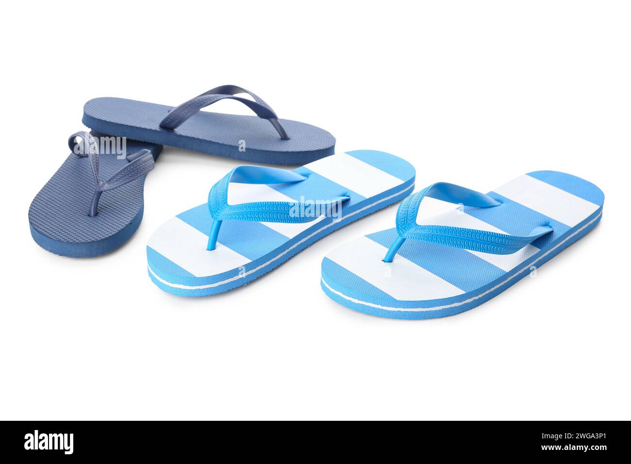 Colorful pairs of female flip flops on white background Stock Photo - Alamy