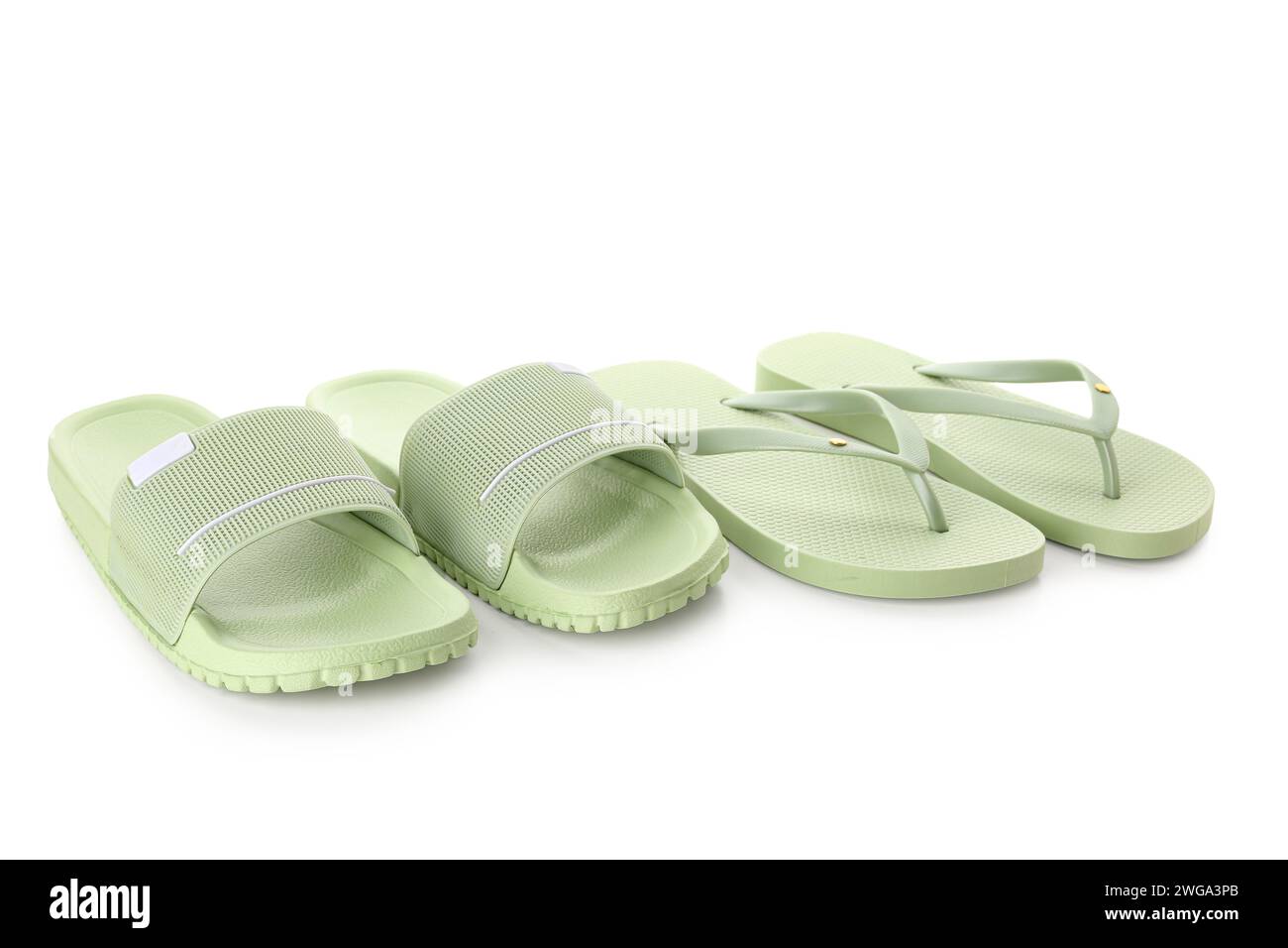 Colorful pairs of female flip flops on white background Stock Photo - Alamy