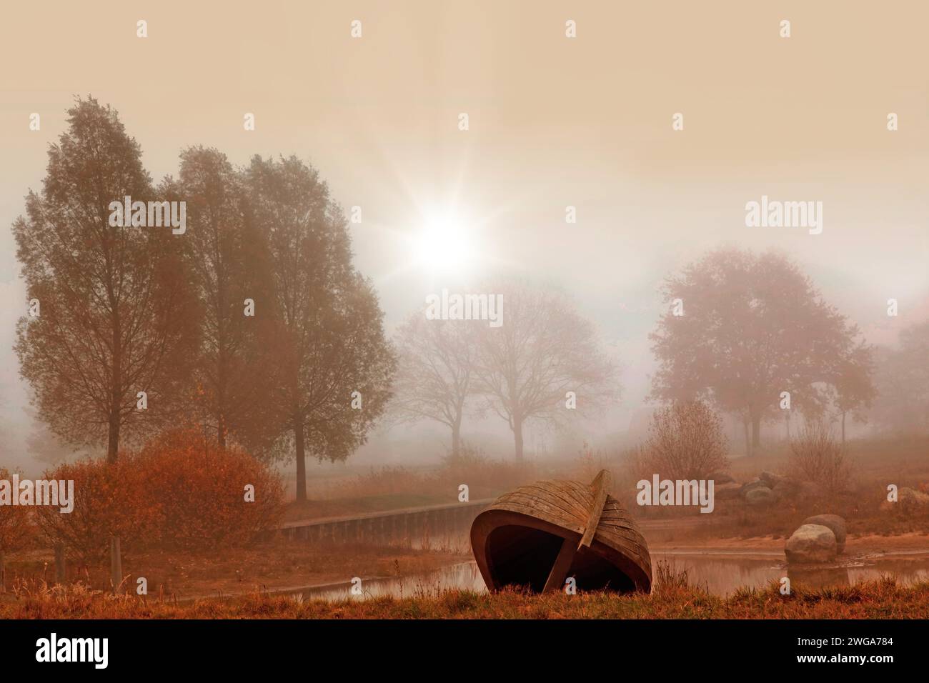 Wooden boat lying overhead on a lake Stock Photo