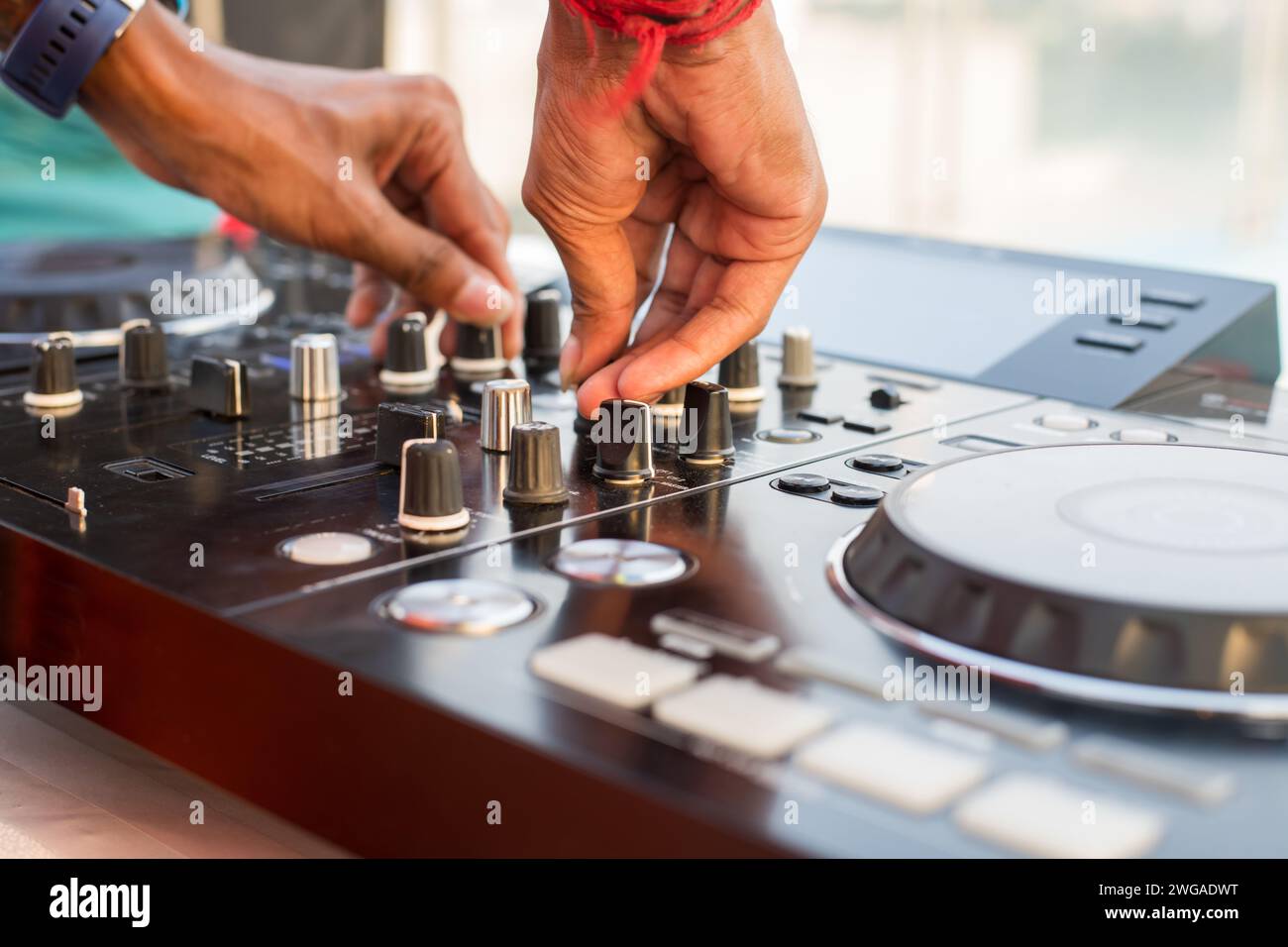 Dj Operating Hand operating control panel hi-res stock photography and images - Alamy