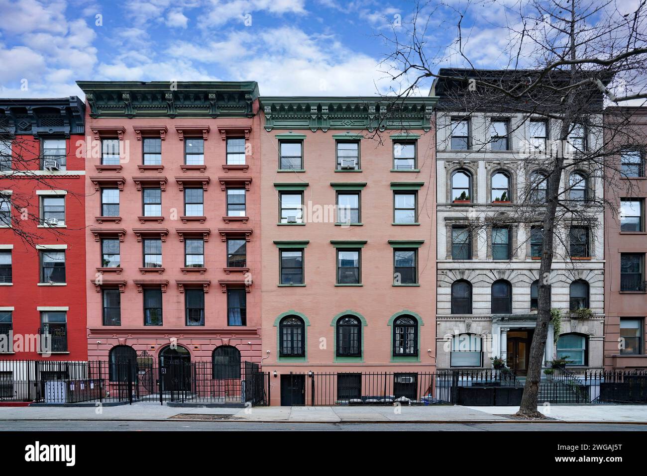 New York City old fashioned apartment buildings with ornate roof cornices Stock Photo