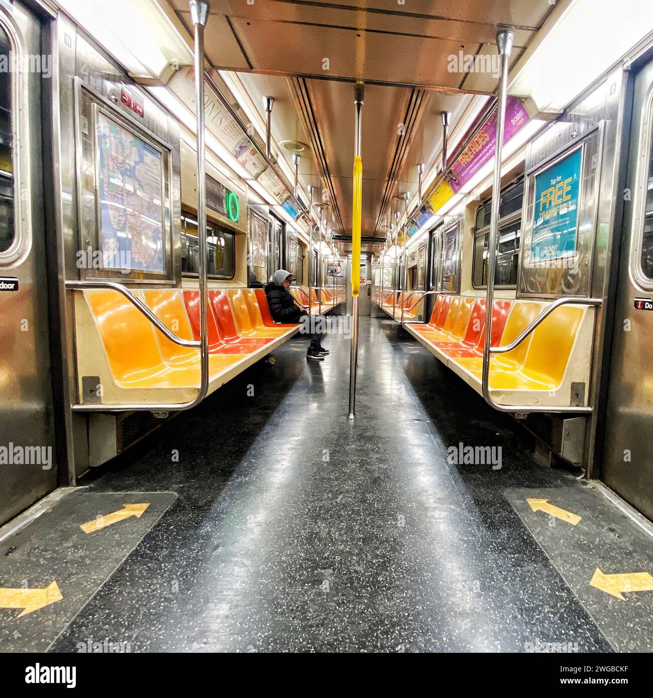 Jack Porter sat alone on MTA train in New York, USA Stock Photo
