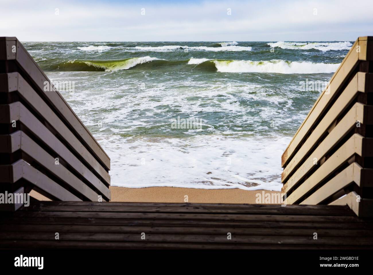 Descent to the sea. Storm waves of the Baltic Sea Stock Photo