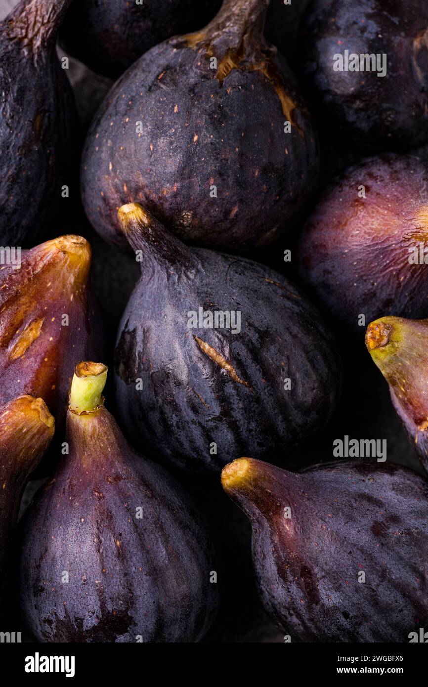 in the foreground, background with fresh and ripe figs Stock Photo