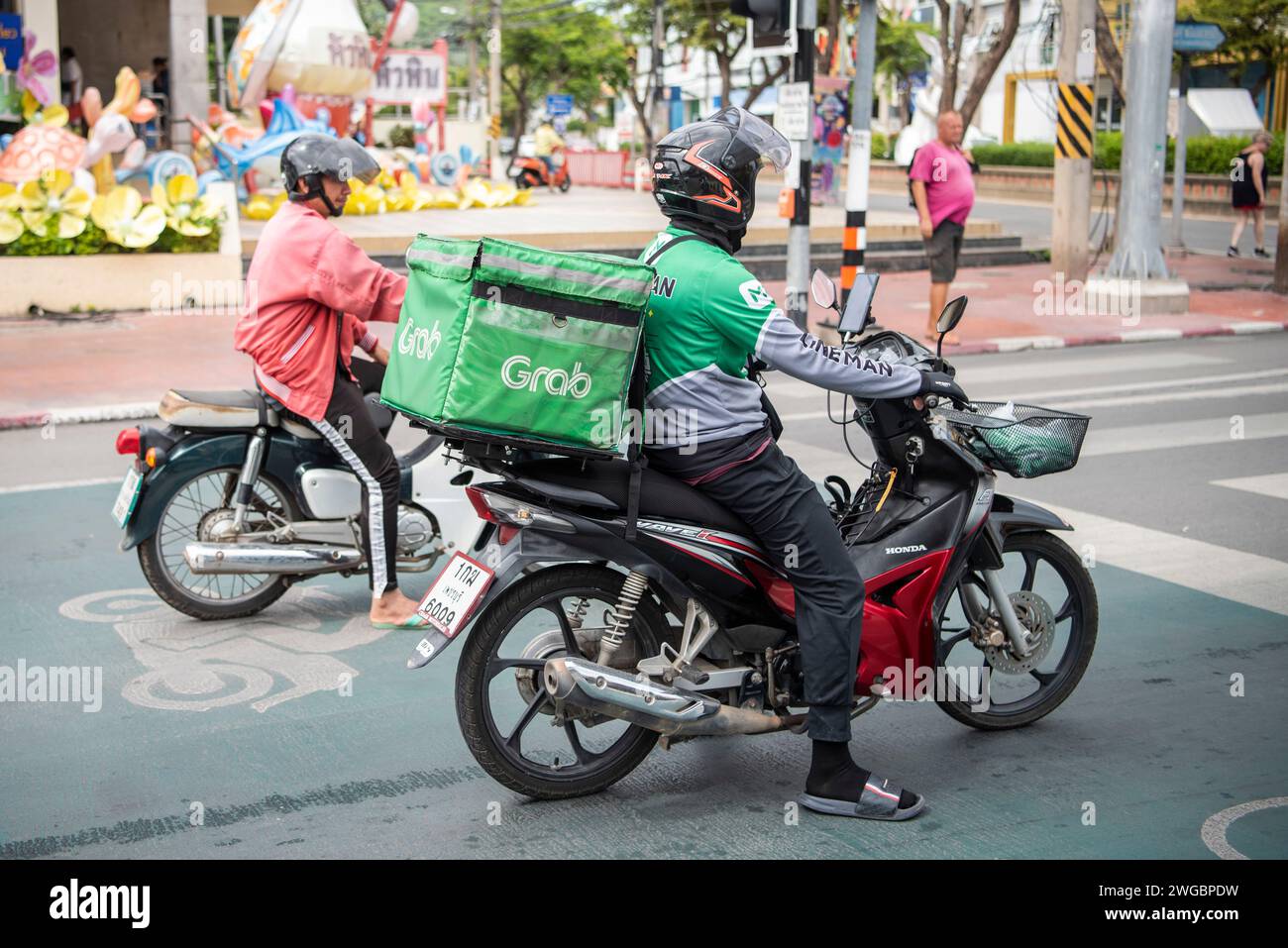 a Grab Food Delivery service motorbike in the town in the City of Hua Hin in the Province of Prachuap Khiri Khan in Thailand Thailand Hua Hin Dece Stock Photo Alamy